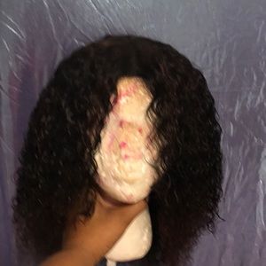 Beautiful Wet n Wavy wig hand made with highlights